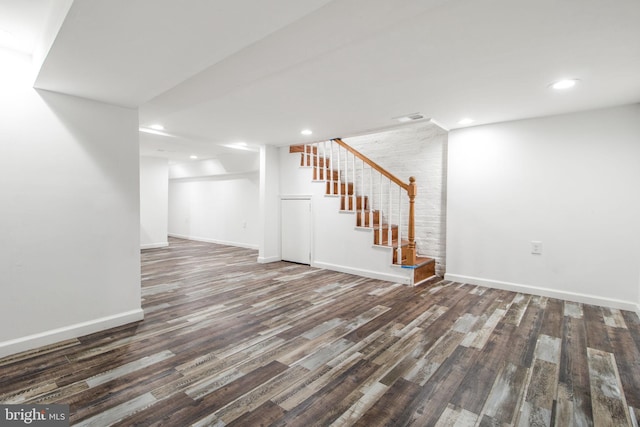 interior space with dark hardwood / wood-style flooring