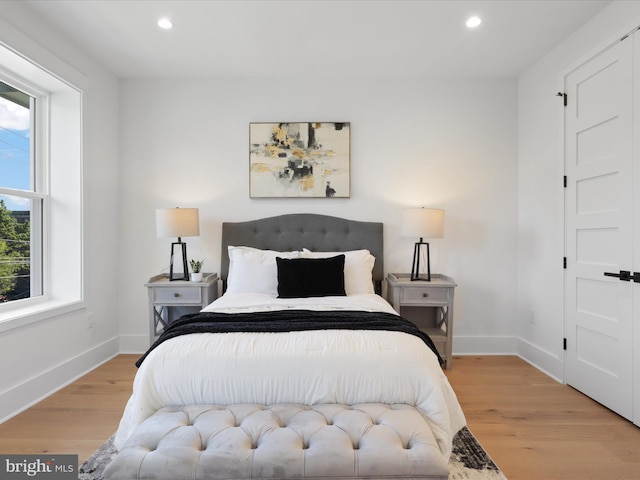 bedroom featuring light wood-type flooring