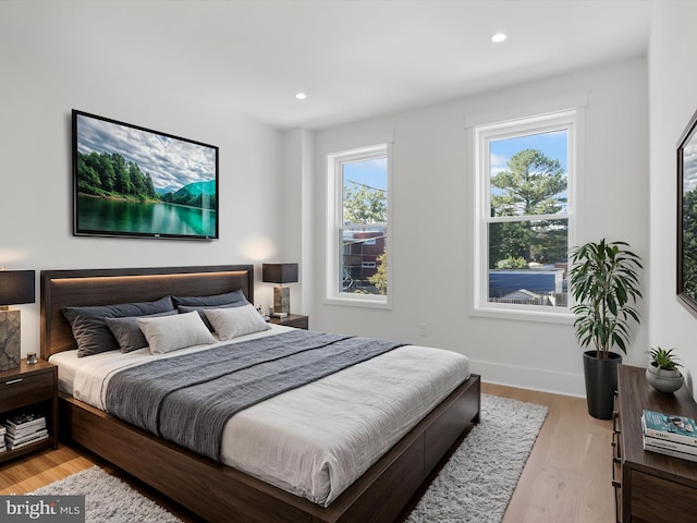 bedroom featuring light wood-type flooring