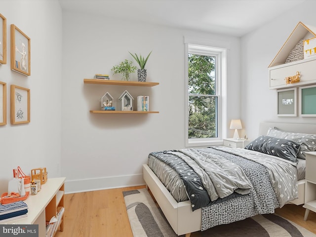 bedroom featuring light hardwood / wood-style flooring