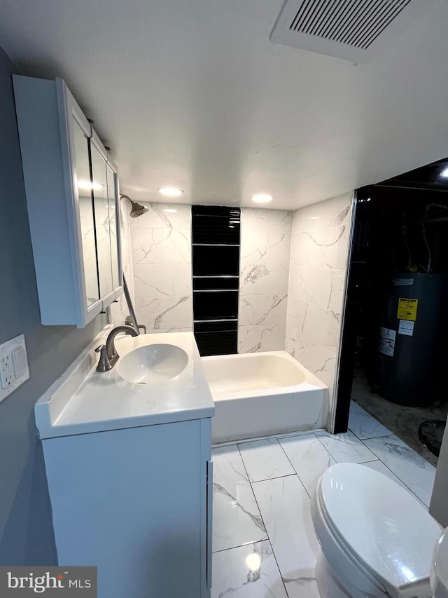120 S Haven St, Baltimore, MD 21224 - full bath featuring electric water heater, vanity, a tub to relax in, toilet, and marble finish floors