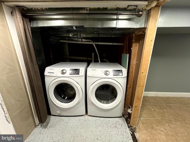 120 S Haven St, Baltimore, MD 21224 - laundry room with washer and dryer and baseboards