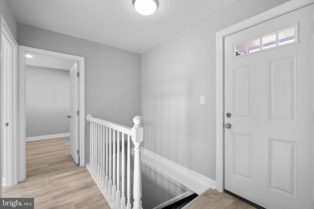 foyer entrance with light hardwood / wood-style flooring