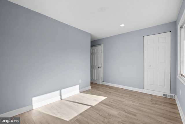 unfurnished bedroom with light hardwood / wood-style floors