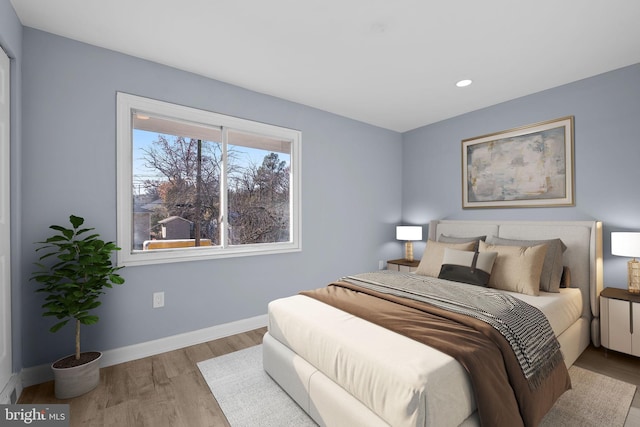 bedroom featuring light hardwood / wood-style flooring