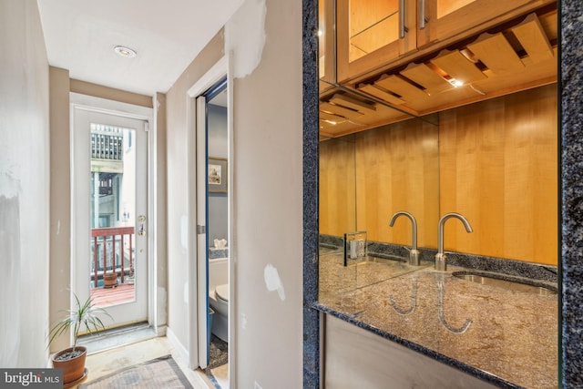 interior space with sink and toilet