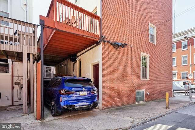 view of side of property featuring a balcony