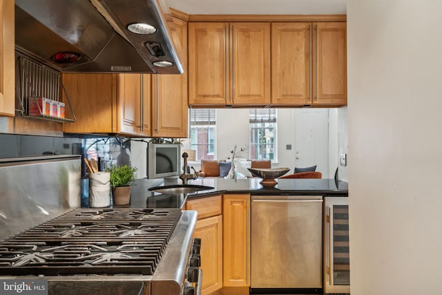 kitchen with ventilation hood, stainless steel fridge, and beverage cooler