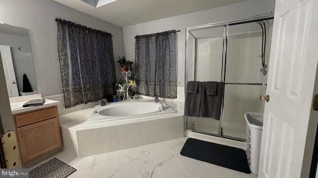 bathroom with shower with separate bathtub and vanity