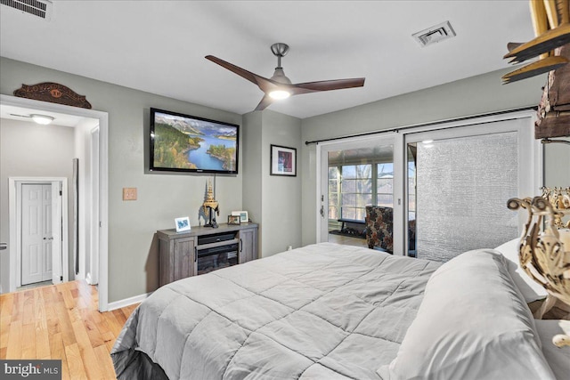 bedroom featuring ceiling fan, access to outside, and light hardwood / wood-style flooring