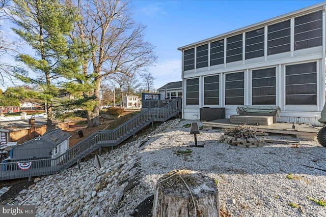 view of yard with a sunroom