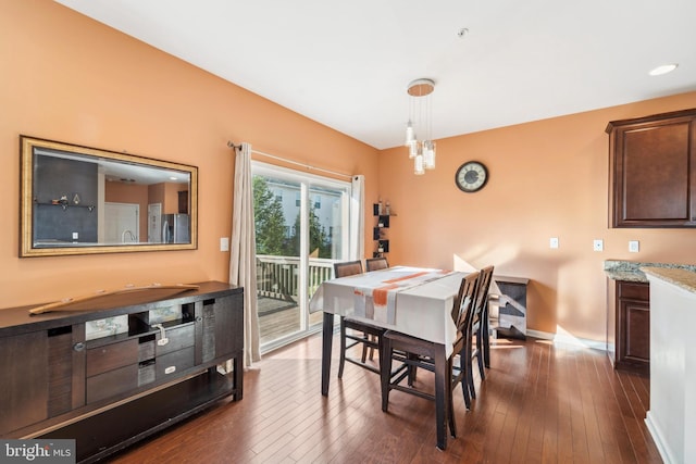 dining room featuring dark wood-type flooring