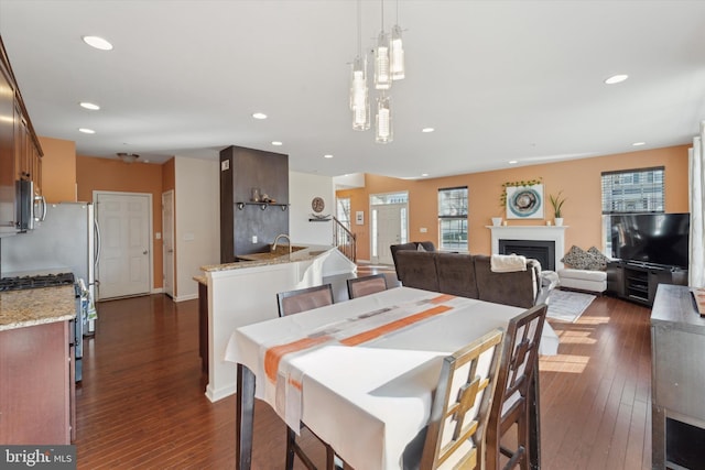 dining area featuring dark hardwood / wood-style floors