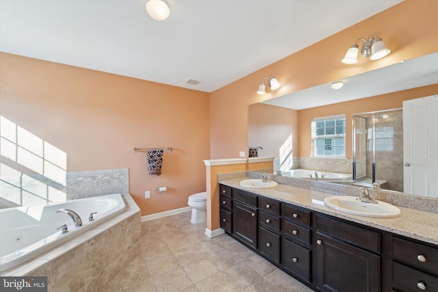 full bathroom featuring tile patterned flooring, vanity, independent shower and bath, and toilet