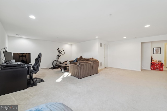 exercise room with light carpet