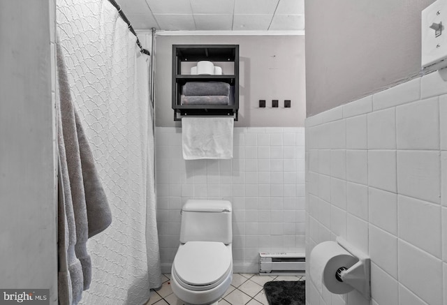 bathroom featuring walk in shower, baseboard heating, tile patterned flooring, toilet, and tile walls