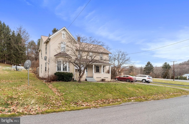 front facade featuring a front lawn