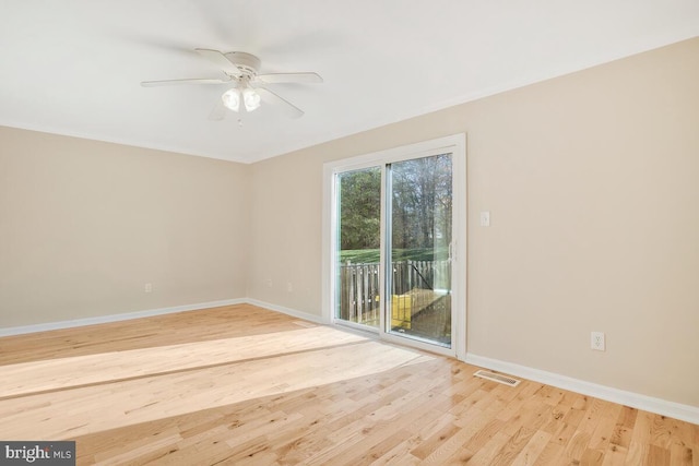 unfurnished room featuring ceiling fan and light hardwood / wood-style flooring