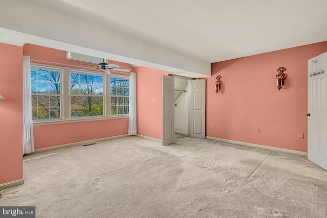 unfurnished bedroom with light carpet