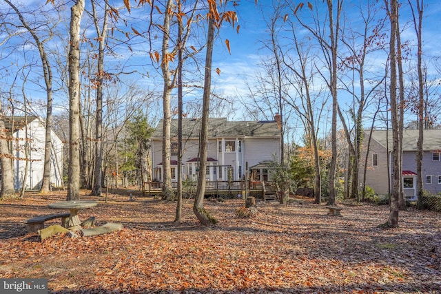 view of front of house with a wooden deck