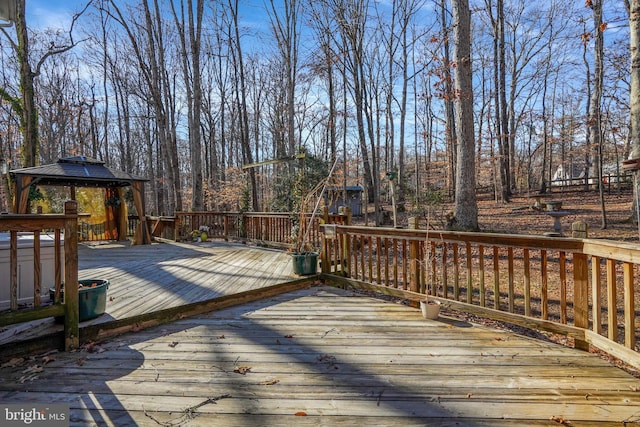 wooden deck with a gazebo