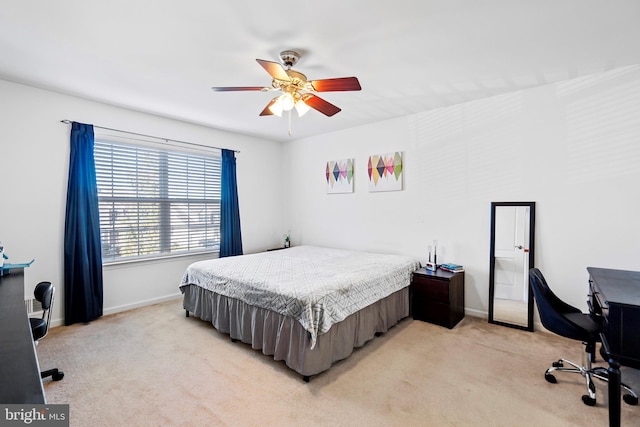 bedroom with light colored carpet and ceiling fan