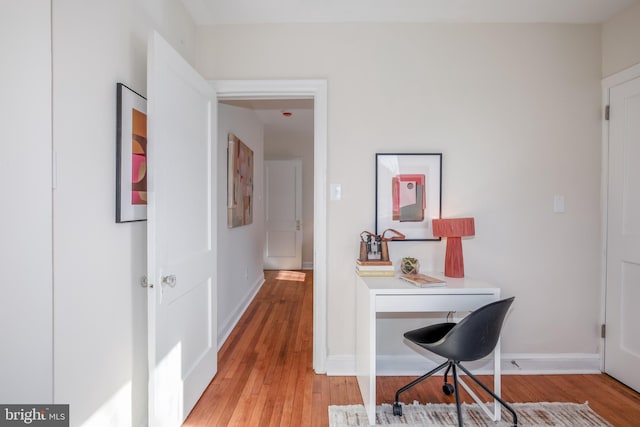 office space featuring light hardwood / wood-style floors