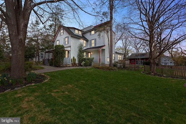 view of front of home with a front yard