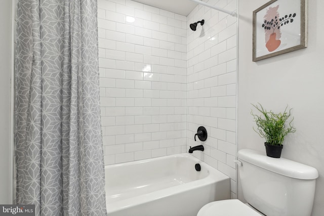 bathroom featuring toilet and shower / bath combo with shower curtain