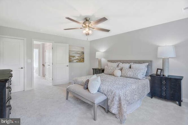 carpeted bedroom featuring ceiling fan