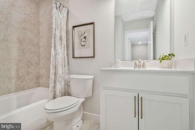 full bathroom featuring vanity, toilet, and shower / bath combo with shower curtain