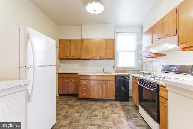 kitchen with white appliances and sink