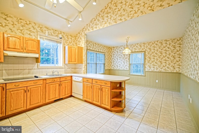 kitchen with kitchen peninsula, white dishwasher, pendant lighting, black electric cooktop, and light tile patterned floors