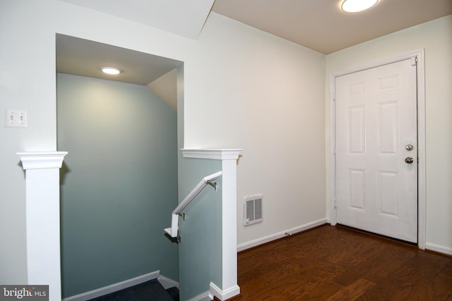 entrance foyer featuring dark wood-type flooring