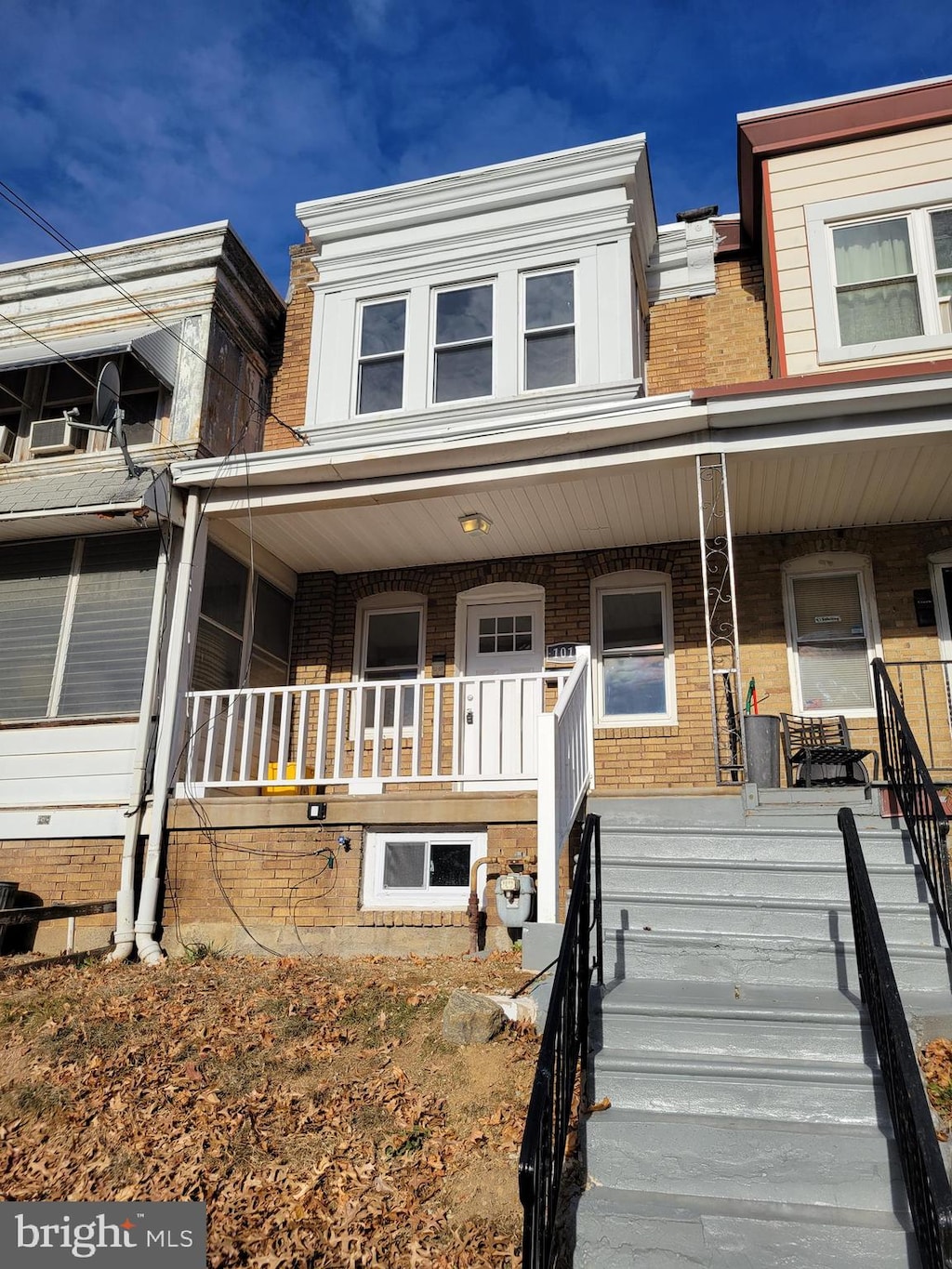 view of property with covered porch