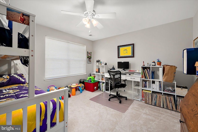 carpeted bedroom featuring ceiling fan