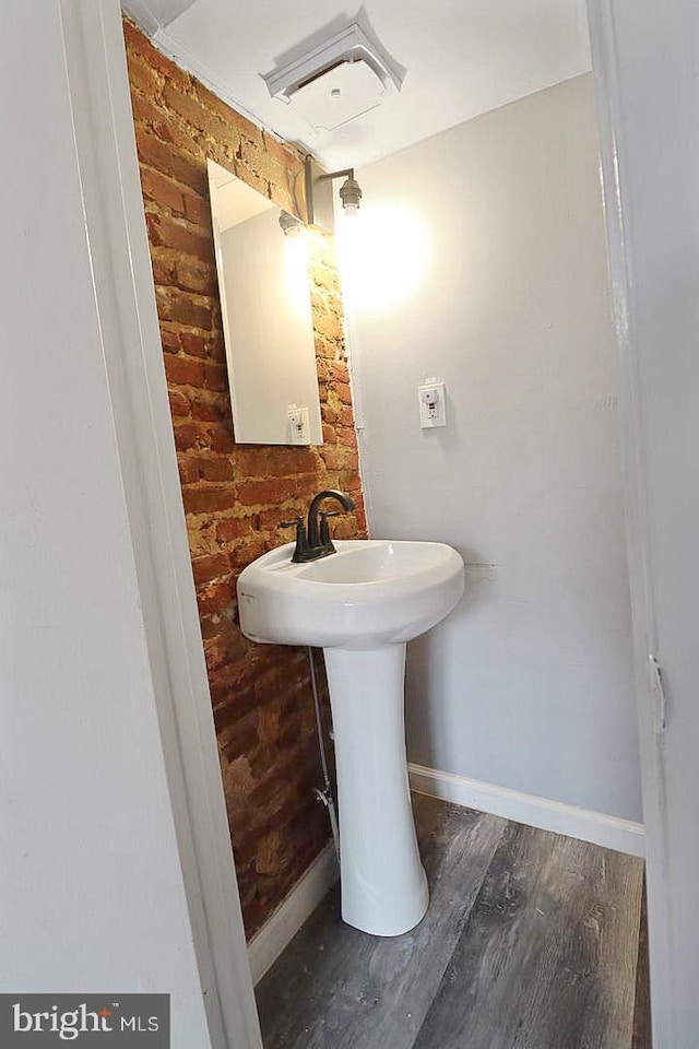 bathroom featuring hardwood / wood-style flooring