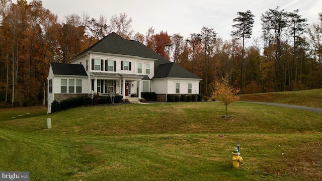 view of front of house with a front lawn