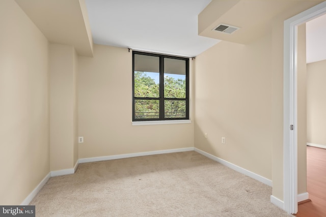 view of carpeted spare room