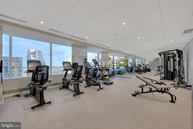 50 S 16th St Unit 5102, Philadelphia, PA 19102 - exercise room with a paneled ceiling, baseboards, and recessed lighting