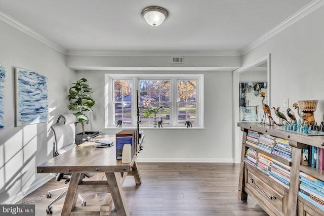 office with crown molding and dark wood-type flooring