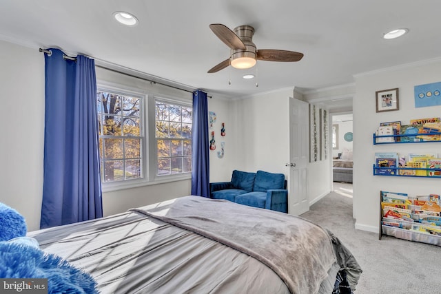 bedroom with ceiling fan, light colored carpet, and crown molding