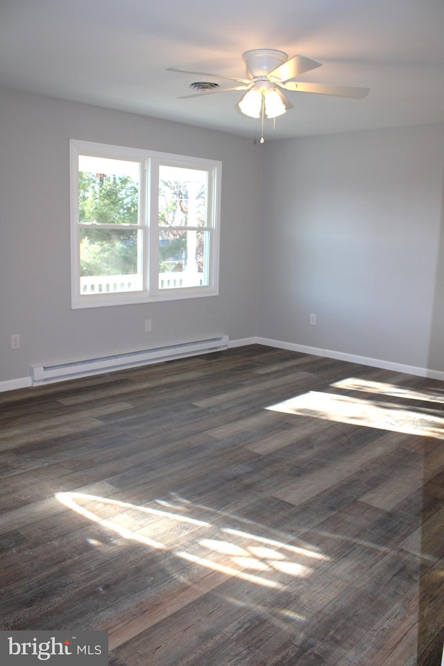 unfurnished room featuring a baseboard radiator, ceiling fan, and dark wood-type flooring