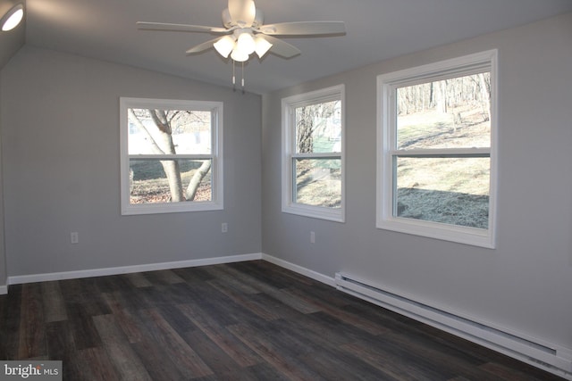 spare room with ceiling fan, dark wood-type flooring, a baseboard radiator, and vaulted ceiling