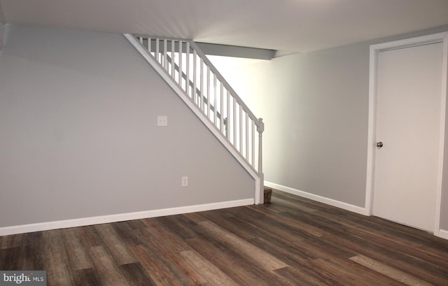 interior space with dark wood-type flooring