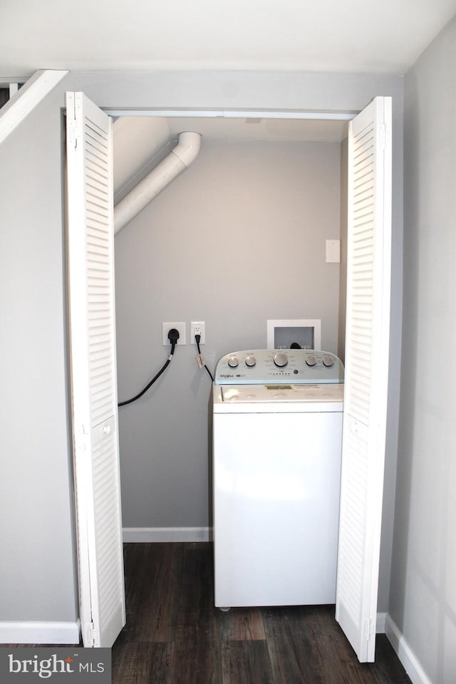 washroom featuring washer / dryer and dark hardwood / wood-style flooring