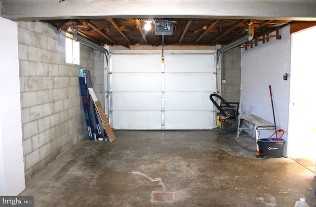 garage featuring a garage door opener