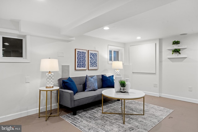 living room featuring concrete flooring