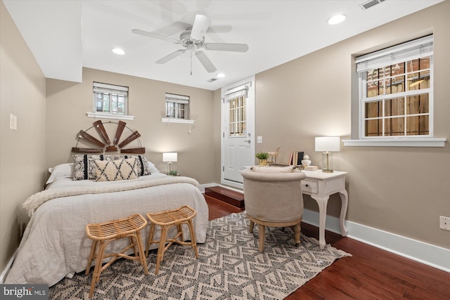 bedroom with ceiling fan and wood-type flooring