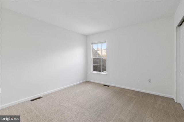 empty room with carpet floors